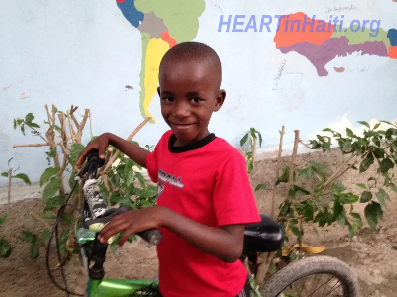 A student tending the school garden
