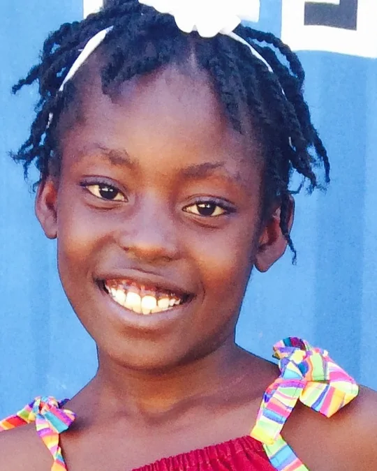 A smiling HEART student