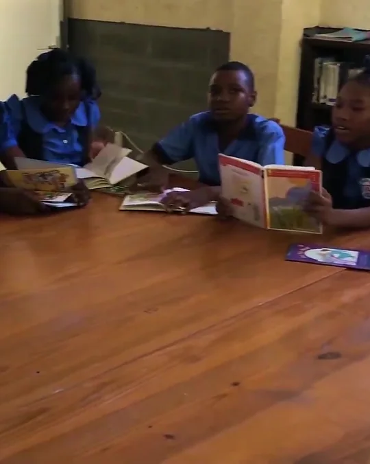 Students reading in the school library