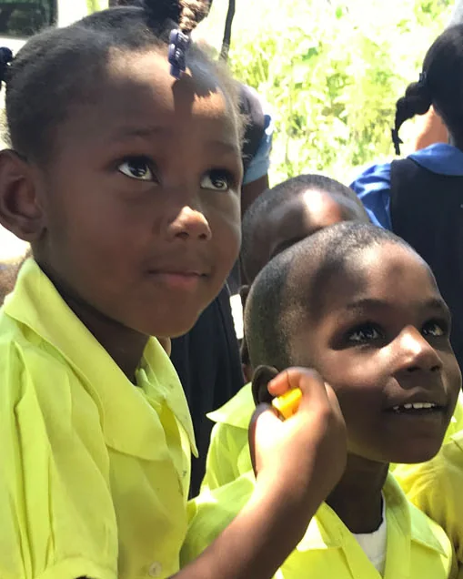 Young students in yellow uniforms
